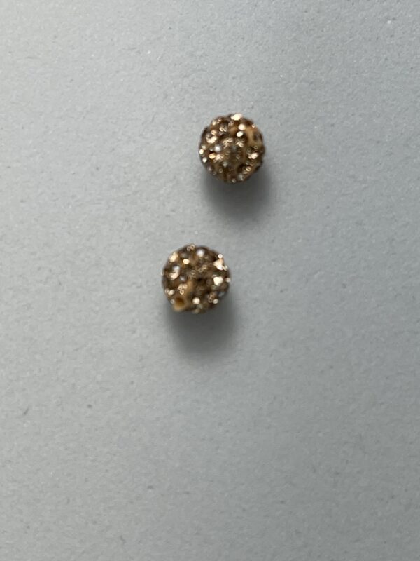 Pair of gold sparkly stud earrings.