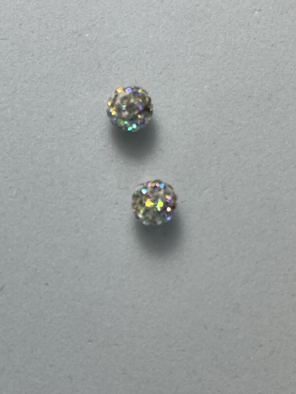 Two iridescent rhinestone beads.