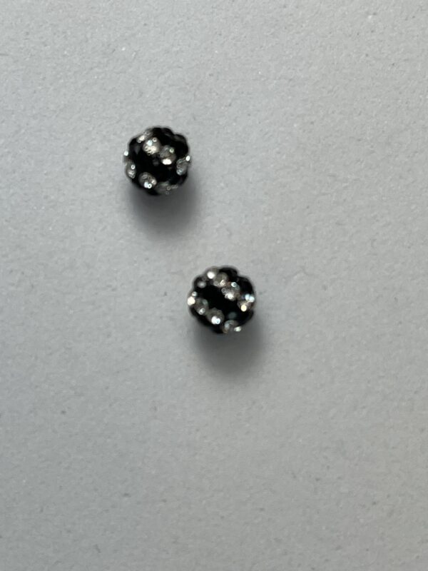 Pair of black rhinestone earrings.