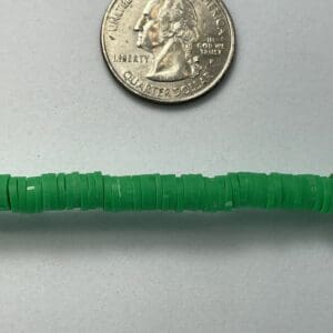Dark emerald heishi beads with quarter